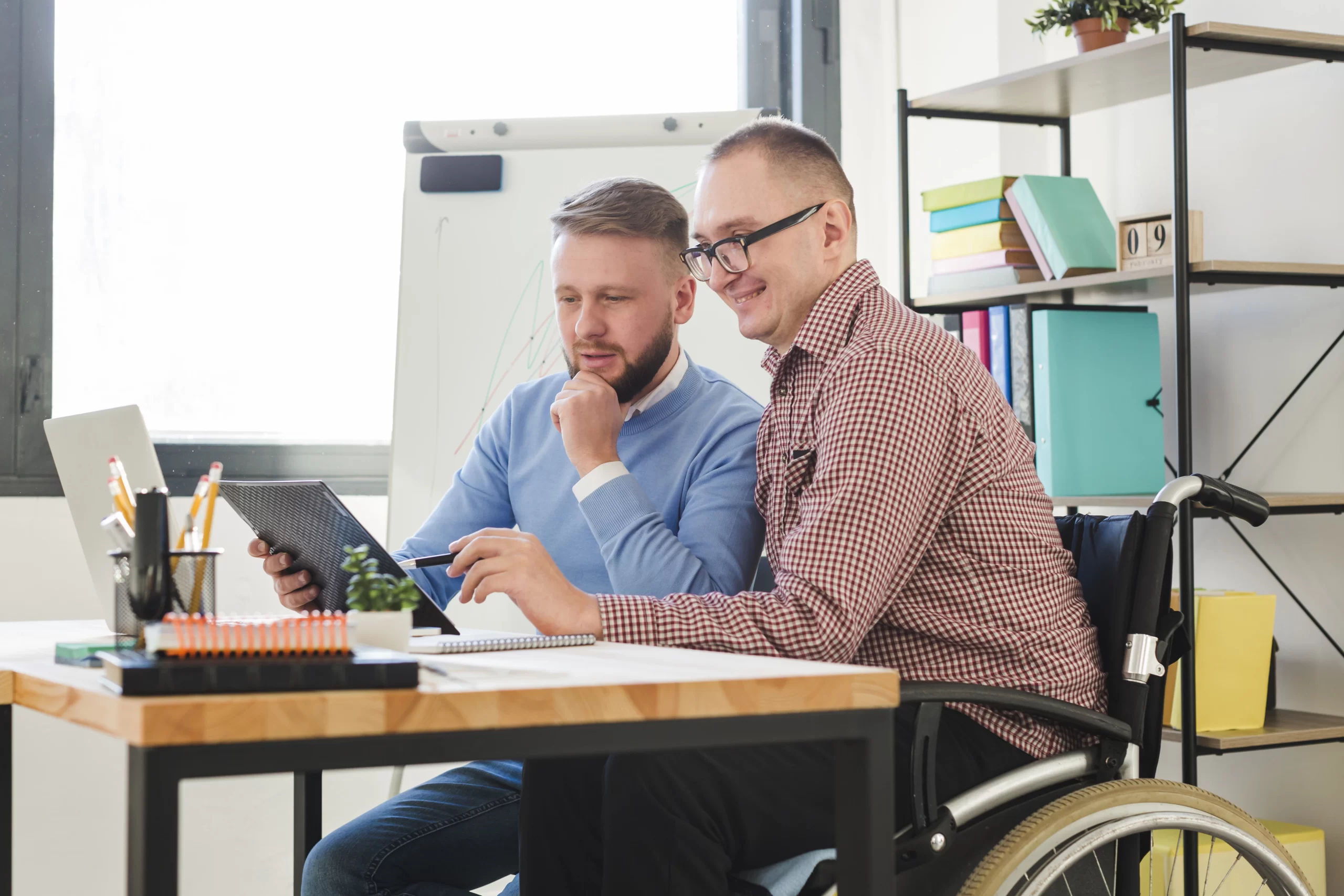 positive-disabled-worker-together-with-manager-office