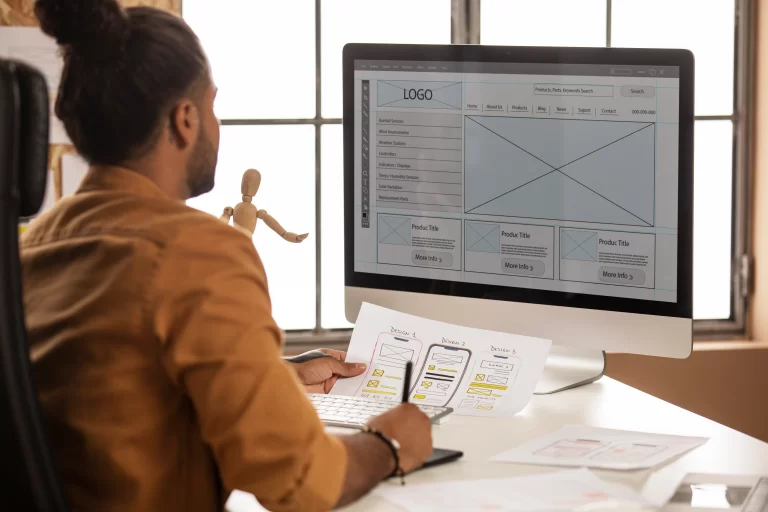 side-view-man-working-with-computer